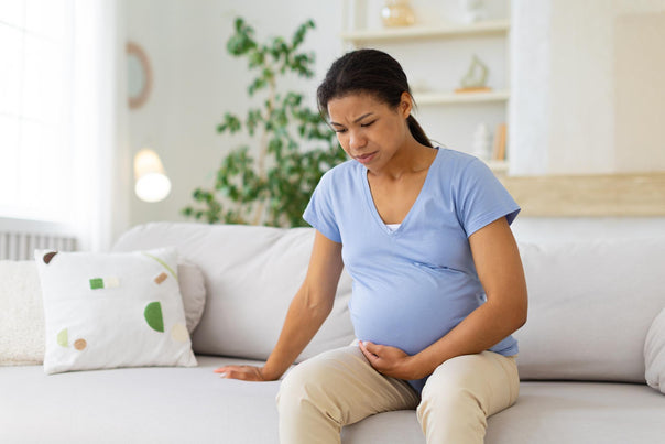 Constipation en début de grossesse : causes, symptômes et solutions efficaces