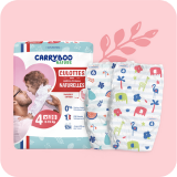 Emballage de culottes d'apprentissage Carryboo avec motifs colorés pour enfants, sur fond rose avec motif de feuille